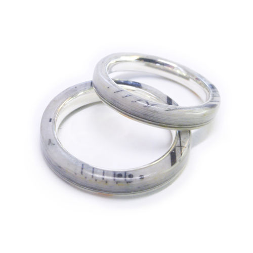 Paper layer wedding bands with Sterling Silver sleeve